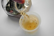 Pouring Tea from Glass Tea Pot
